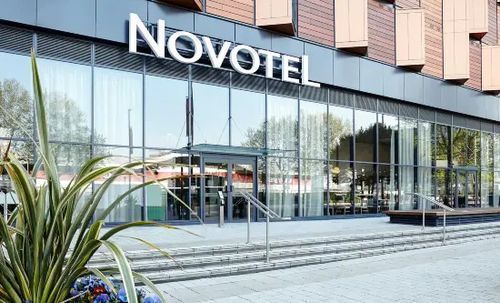 62a26c1061bbaf94371d1f49 novotel exterior landscape p 500